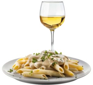 Prato de penne ao molho cremoso com ervas frescas, acompanhado de uma taça de vinho branco.